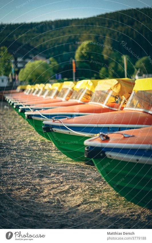 Pedal boats take a break Pedalo Boating trip Lake Lakeside vacation Exterior shot Summer Tourism Watercraft Vacation & Travel Navigation Trip Summer vacation