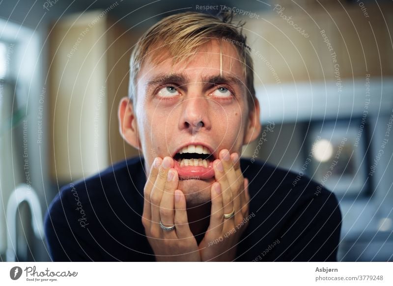 Man stressed and frustrated surprised confused fearful expression why? thinking future Human being Emotions Funny Portrait photograph Face Stress Problem