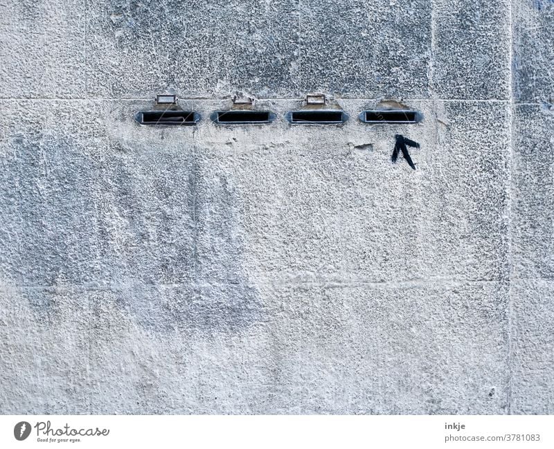 Voters of the right Wall (building) Facade Colour photo Gray Gloomy Copy Space Slit four Arrow Clue Exterior shot Wall (barrier) Deserted Building Right