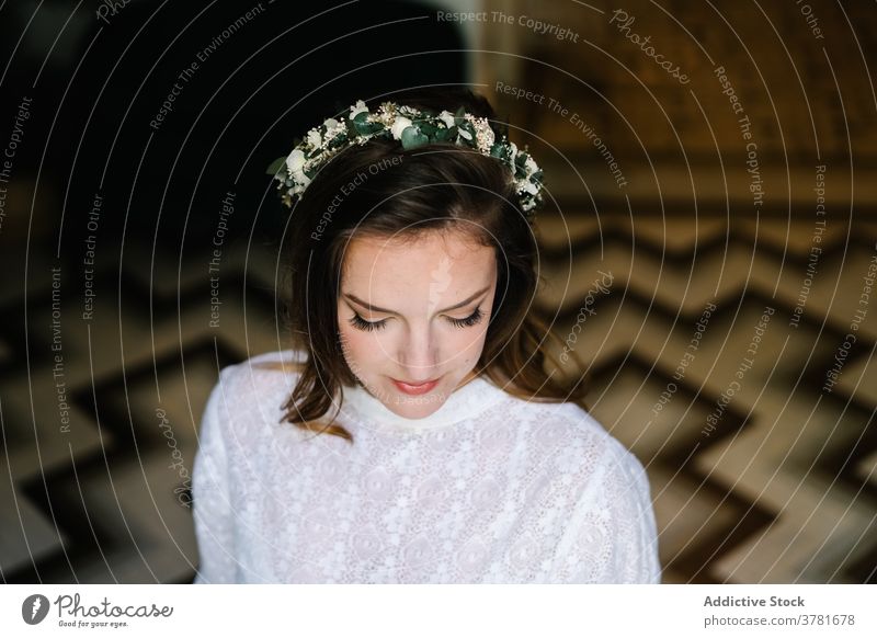 Calm woman in white dress at home flower wreath bride elegant wedding calm delicate style charming female appearance floral flat trendy peaceful stand young