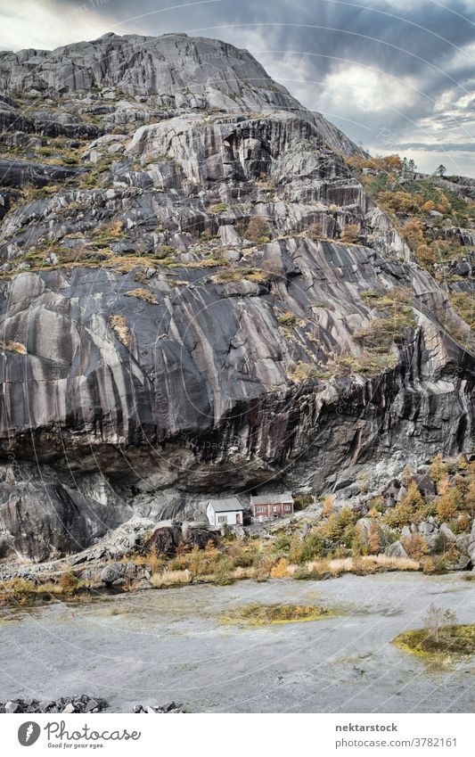 Jøssingfjord Helleren Rock Formation with Houses helleren house rock shelter stone Norway nature natural geology rock formation water sky long shot no people