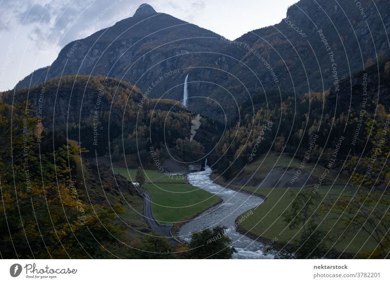 Kjosfossen Waterfall with Landscape and River waterfall river mountain flow autumn Norway north nature natural lighting outdoors scenery scenics landscape