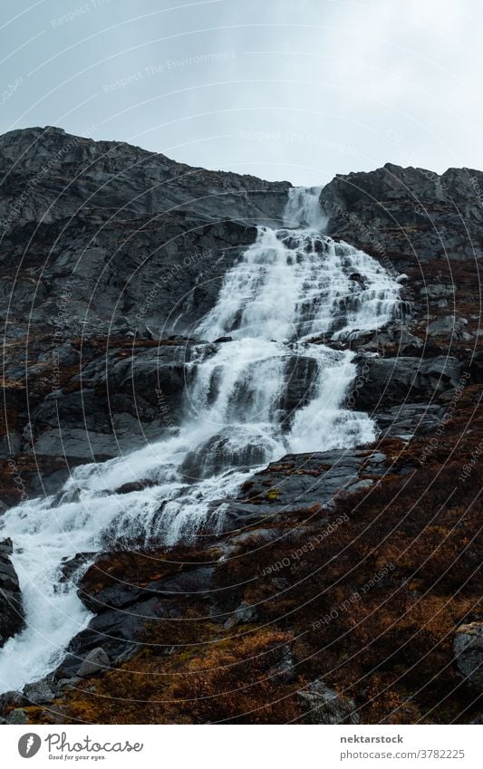 Cascade Waterfall Over Rocky Terrain waterfall mountain cascade autumn Norway north nature natural lighting outdoors scenery scenics landscape beauty in nature