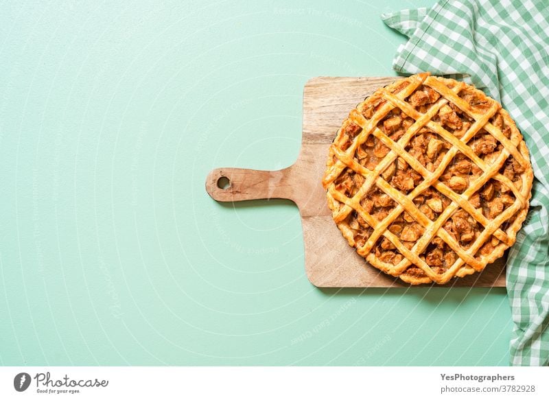 Apple pie on green table, top view. Homemade apple tart 4th july above view american apple pie background baked bakery baking cake christmas copy space crust