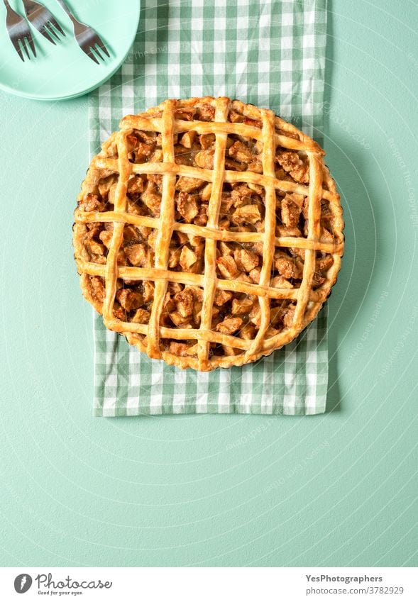 Homemade apple pie top view on green table. Delicious apple cake. 4th july above view american background baked bakery baking christmas copy space crust cuisine