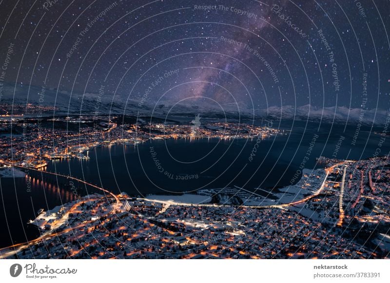 Illuminated Tromsø Nighttime Cityscape with Stars in Sky cityscape townscape night illuminated stars milky way starry winter panoramic sky bird's eye view