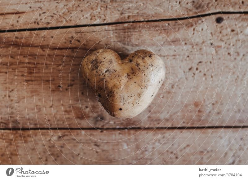 Heart of potato - on wood Vegetable Healthy Eating Vegetarian diet Food Organic produce Vegan diet Food photograph Organic farming Heart-shaped Love boil