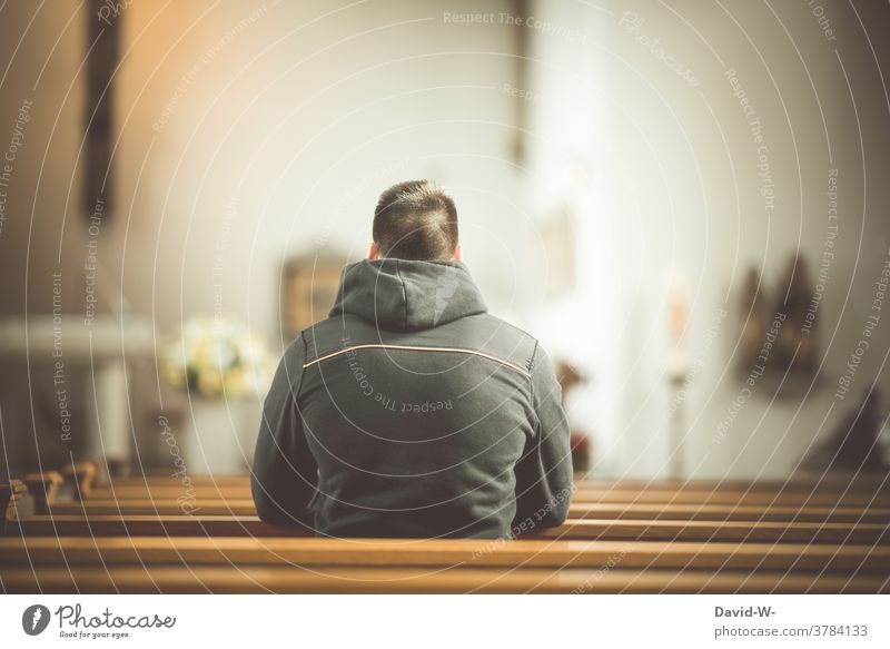 Man sits in a pew in church and prays Belief Church Church pew religion Hope Prayer praying believe Anonymous