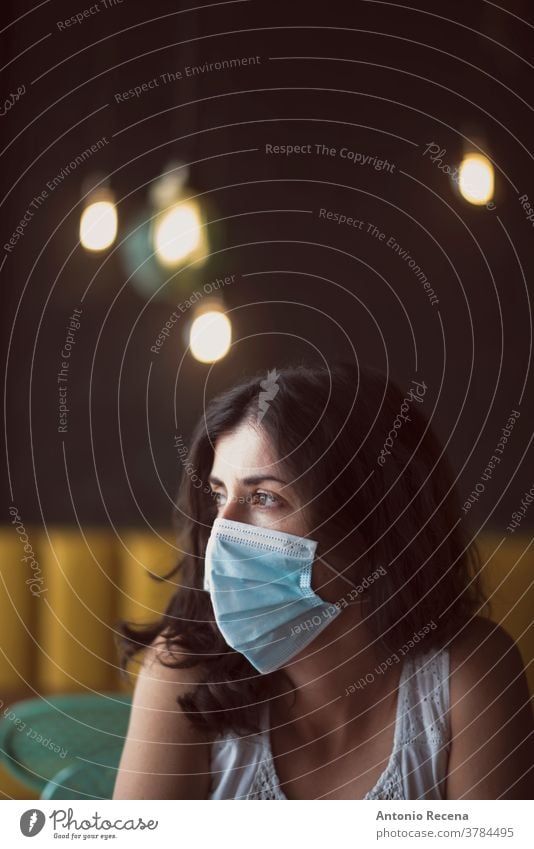 Woman portrait with surgical mask face covid-19 coronavirus pollution allergy person people one person protective corona virus mid adult 30s 30-35 years