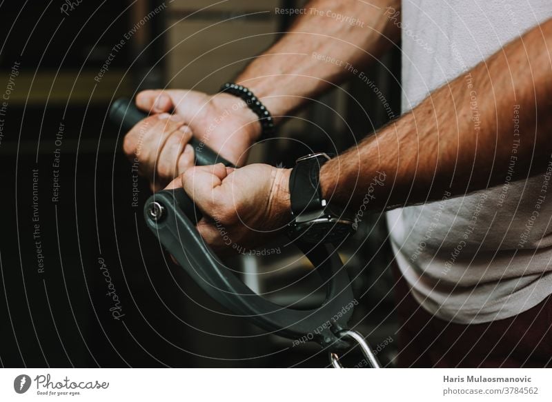 Man hands working out in gym close up man man hands gym time muscles strong Fitness fitness training Healthy Lifestyle pull routine excercise excercising