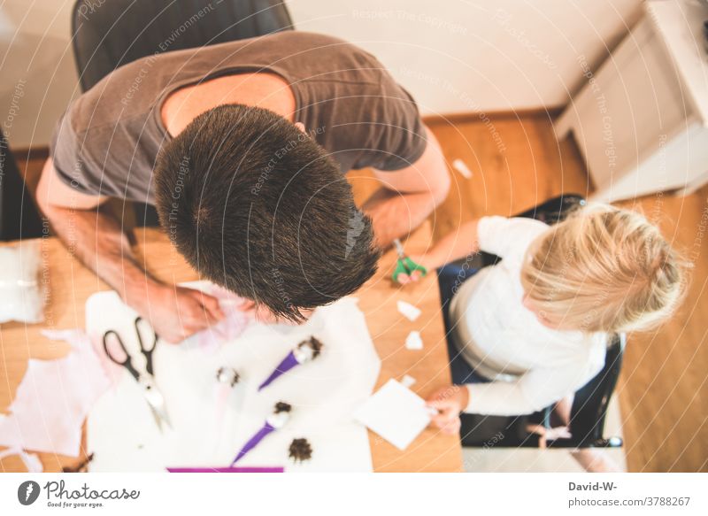 Father and daughter tinkering together Handicraft Child dad in common at the same time fun Parents Family Employment Joy Together Claw Daughter Infancy