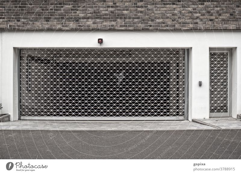 Entrance of an underground car park Underground garage Parking Safety Protection Highway ramp (entrance) Garage mystery Closed safeguarded Grating Hideous sure