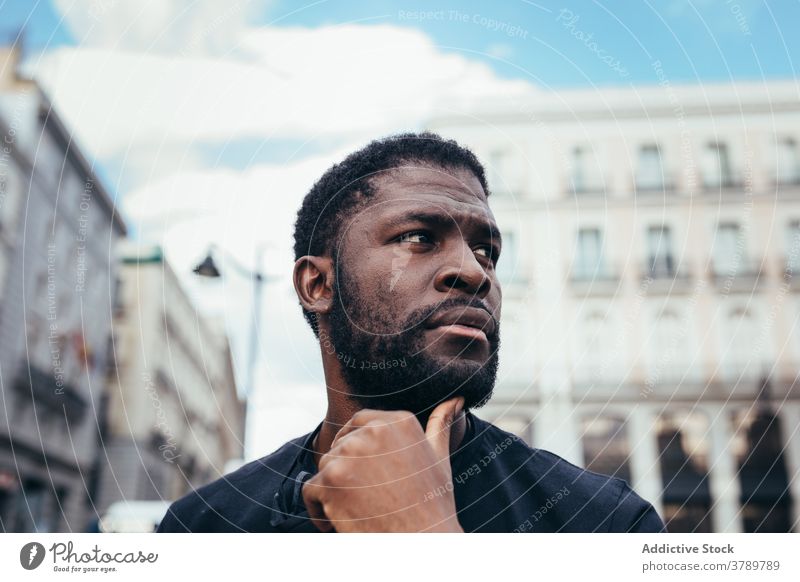 Black man on demonstration against police brutality protest people black racism violence lives social justice black lives matter sign american activism racial