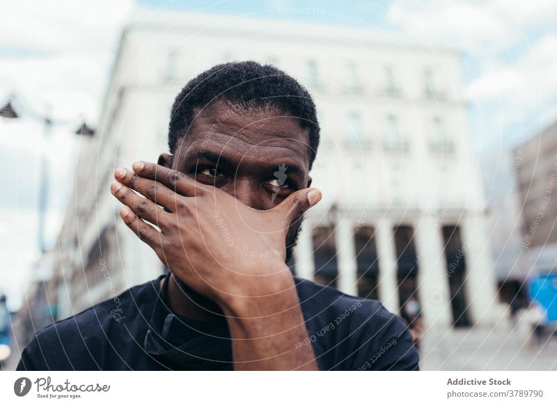 Black man on demonstration against police brutality protest people black racism violence lives social justice black lives matter sign american activism racial