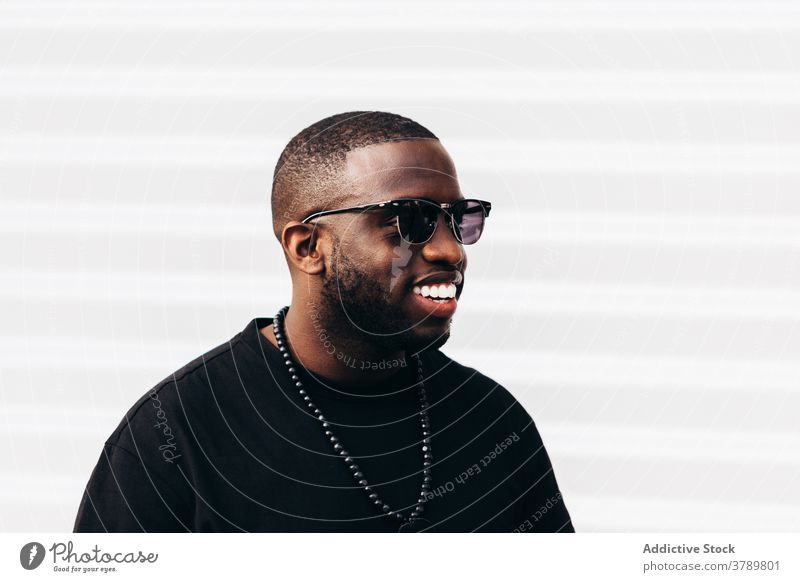 Happy black man posing over white background happy portrait african people american male person guy adult expression one laughing confidence face cool cheerful