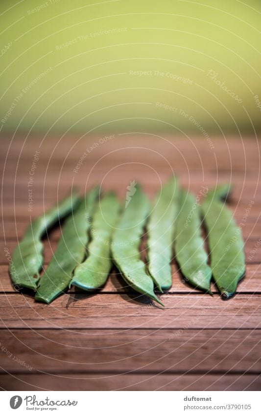 Macro photo of seven lying green beans Bean runner beans Green Nutrition Macro (Extreme close-up) Structures and shapes structure sieving Vegetarian diet Legume