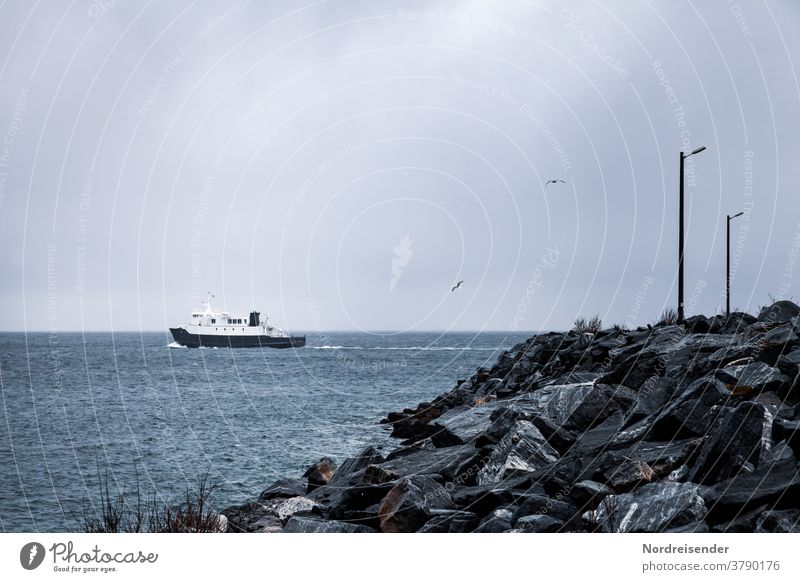 Small ferry in the polar sea off Norway Ferry Ocean Troms Island ferry connection Maritime Connection ship investor Ferry harbour Sparse Mole street lamp