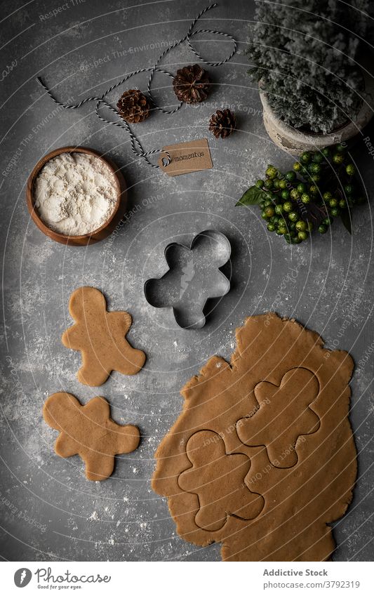 Dough for gingerbread for Christmas on table dough christmas cookie cutter dessert party arrangement sweet homemade tradition holiday delicious flour bowl