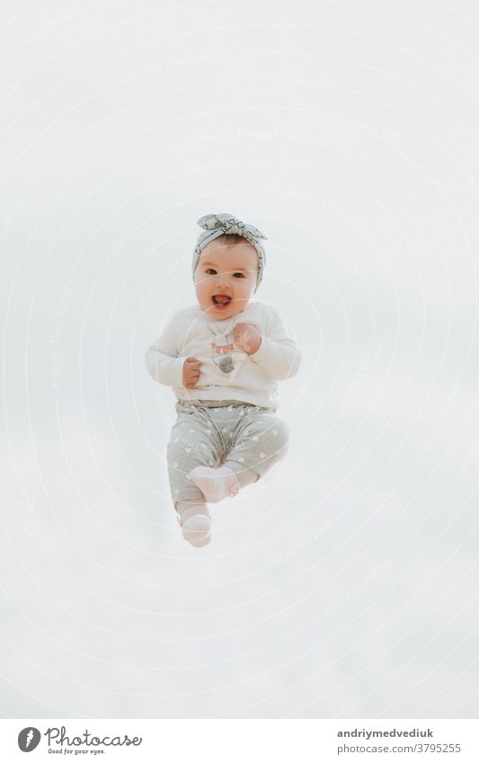 portrait of a child in the air. Beautiful smiling child concept helmet plane blue beautiful young kid caucasian people joy happy girl female childhood lifestyle