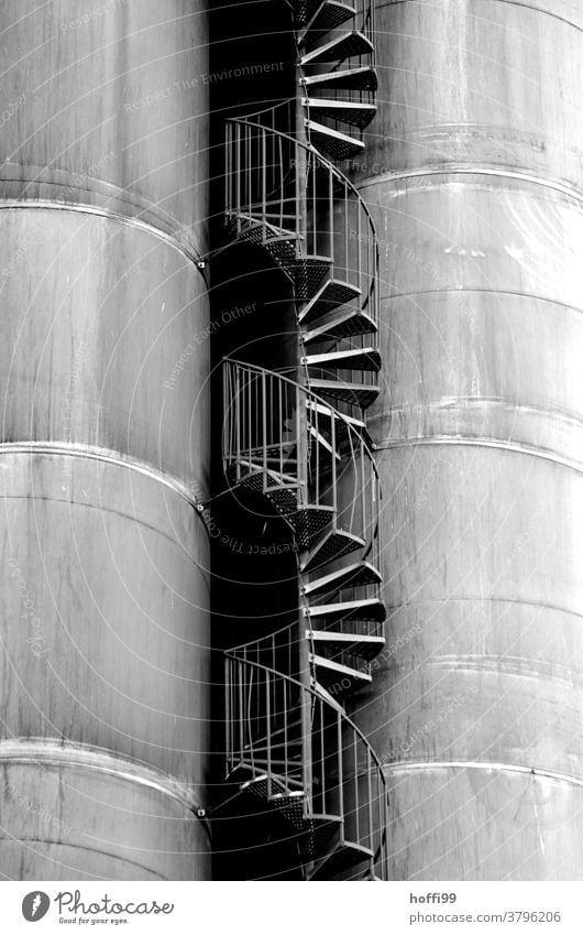 Stairs between the tanks Winding staircase Industrial plant Curve Industry Storage shed Gasometer Harbour Energy industry Silo Banister Gas tank Oil tank Facade