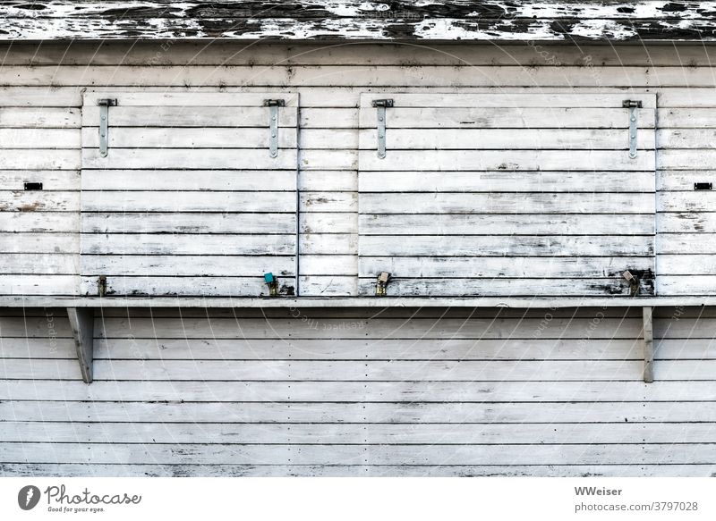 The kiosk is closed and works only as a lost place Kiosk drink Small sausage Closed too Locks Window Expenditure Wood stand Load Weathered locked boards slats