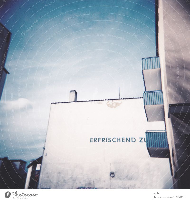 refreshingly Deserted Fresh Refreshment White Blue Sharp-edged Old Living or residing Characters Sign Balcony Wall (building) Wall (barrier) Kassel Town