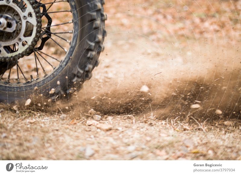 Motocross endurance wheel closeup motor extreme motocross dirt motorcycle competition racer rider sport power motorbike terrain speed offroad rally one woods