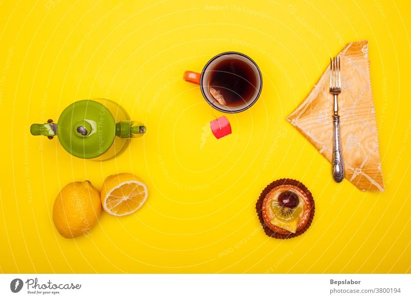 Top view of vintage teacup and cup with lemon and pastry on pink background flat lay top view breakfast green teapot beverage herbal set colorful boiling drink