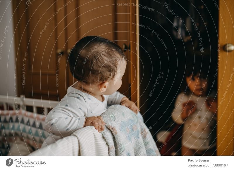 Brother playing with sister at home Brothers and sisters Family & Relations family 2 Sister Friendship Together Colour photo Human being Child Playing Joy