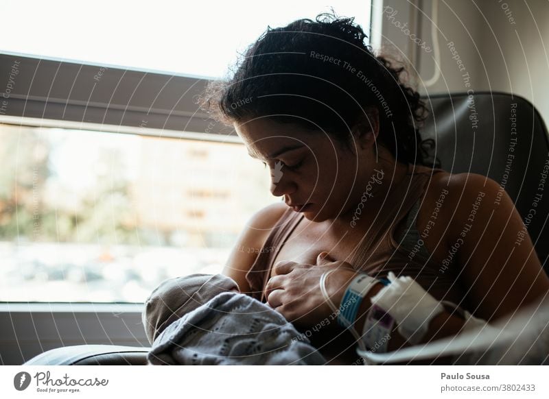 Mother breastfeeding newborn at hospital Nursing Hospital Newborn newborn photography Baby Lifestyle Together togetherness Child Love Infancy motherhood