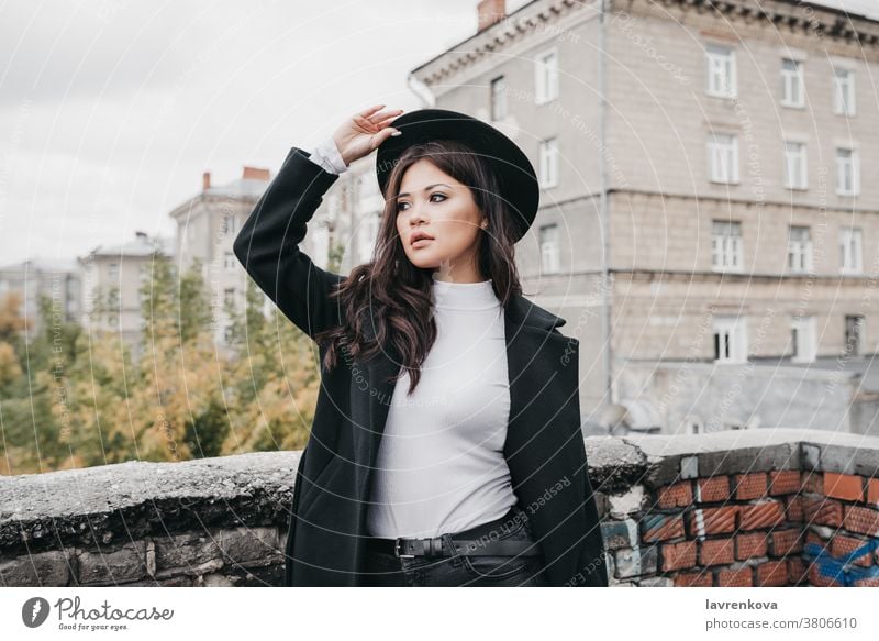 Autumn portrait of young asian in the hat and coat outdoors girl sweater female lifestyle beautiful woman autumn happy seasonal leisure outside brunette urban