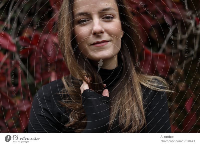 Close portrait of a young woman in front of wild wine Woman 18 - 30 years pretty fit Slim smart kind Pleasant Attractive Brunette Long-haired salubriously Fresh