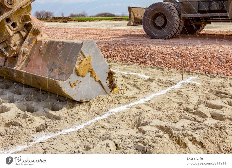 Excavator will dig precise inside marked area at building site Accurate Alignment Arm Backhoe Border Boundary Bucket Building Site Chalk Civil Engineering