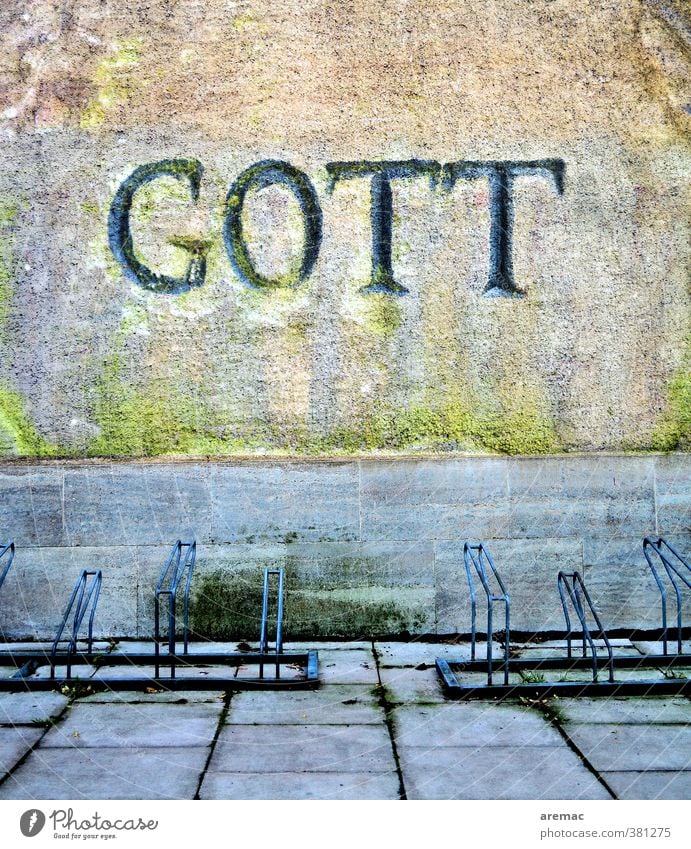 standoffish Stone Sign Characters Gray Religion and faith God Bicycle rack Colour photo Subdued colour Multicoloured Exterior shot Structures and shapes