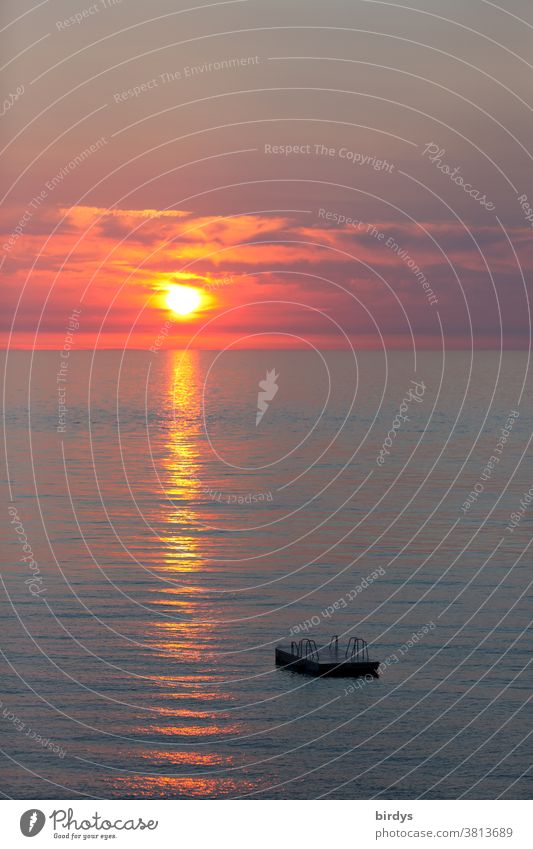 orphaned bathing raft at sunset in the sea, bathing place Sunset Sunrise Ocean Horizon Rafts Platform Bathing place Bathing Raft afloat Red Reflection