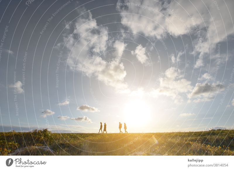 dudes on the dike Dike people Trip Sky Grass Colour photo coast North Sea Day Meadow Ocean Vacation & Travel Exterior shot Landscape Nature Summer Tourism