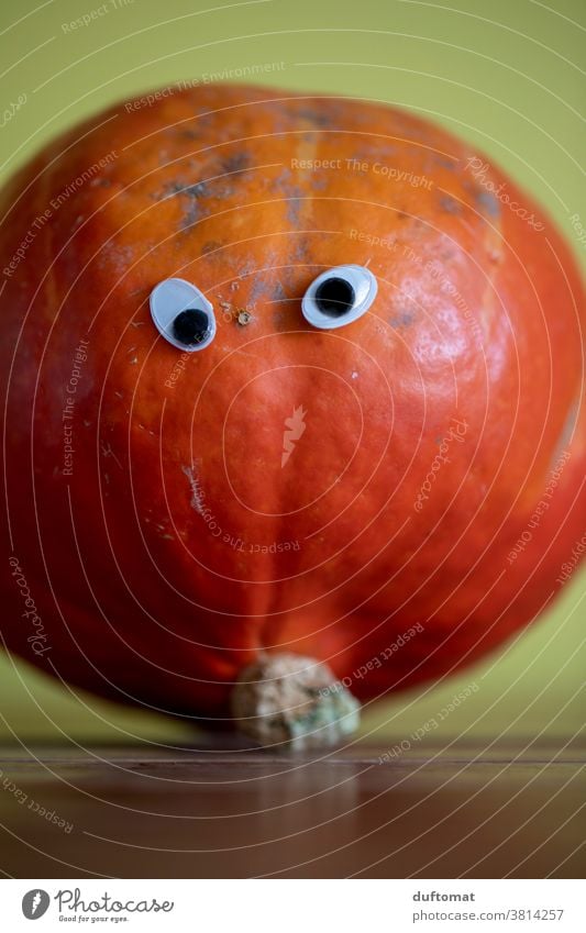 Halloween pumpkin with glued eyes Hallowe'en Pumpkin Autumn peep Thanksgiving seasonal Orange Food Vegetable October Decoration Public Holiday Squash Farm