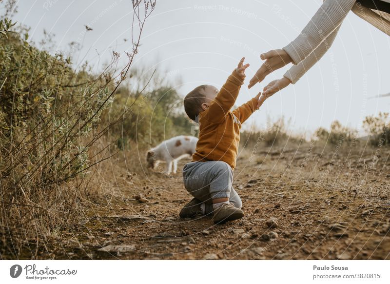 Toddler raising hands to Mother Caucasian 1 - 3 years Together togetherness Parents Lifestyle Happiness Family & Relations Child Infancy Happy Joy Love