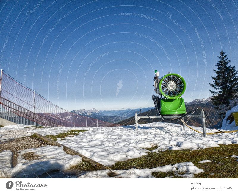 Ready to fire snow cannon on a mountain Snow cannon Artificial snow Snowscape snowmaking Climate Anticipation Green Cold Mountain Beautiful weather Winter