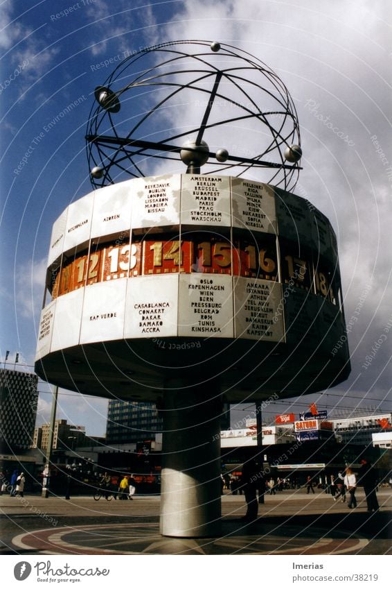 Time in change Summer Clock Advancement Future Information Technology Sky Clouds Capital city Places Architecture Landmark Steel Digits and numbers Globe Blue