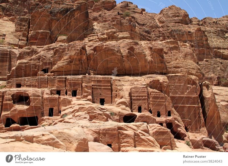 Monumental building carved out of rock in the ancient Jordanian city of Petra. architecture culture desert desert city exterior facade historic history jordan