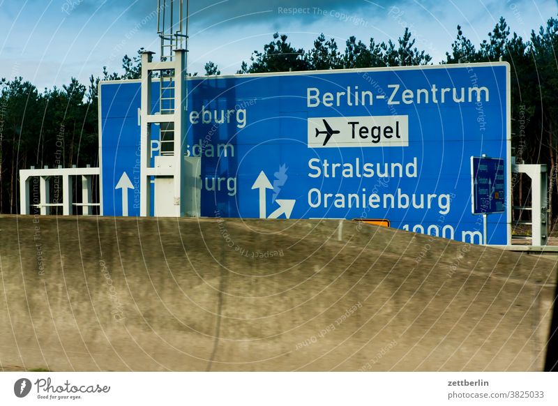 Signposts to Tegel, Stralsund and Oranienburg Turn off Highway Lane markings Clue edge Curve Left navi Navigation Orientation Arrow Right Direction Street tip