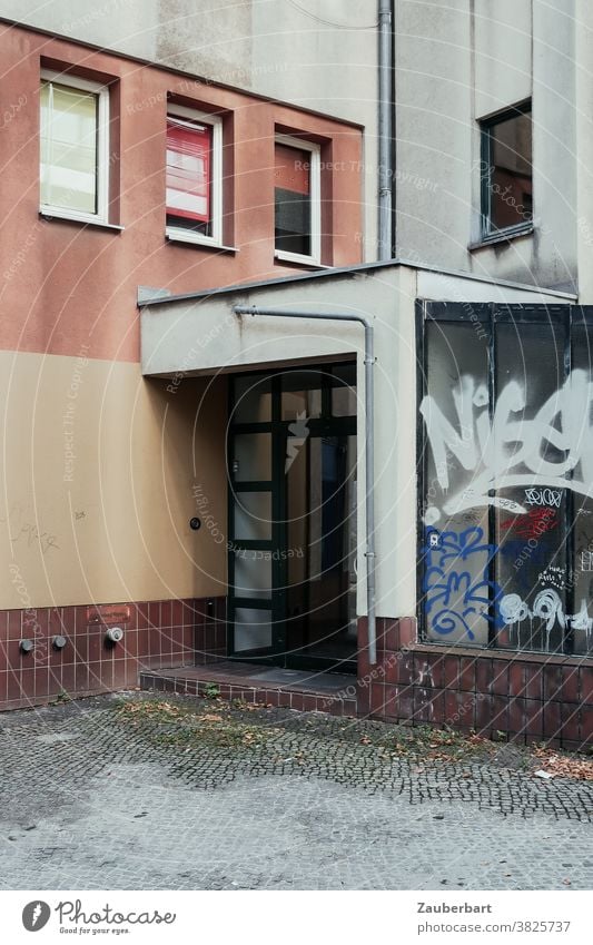 House entrance, windows and graffiti in the city House (Residential Structure) Entrance Apartment Building Window Front door Town Graffiti City Gloomy