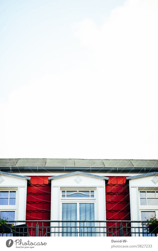 House with balcony and lots of sky Balcony Sky House (Residential Structure) Cozy Red Placeholder Window Chic Living or residing Building Architecture