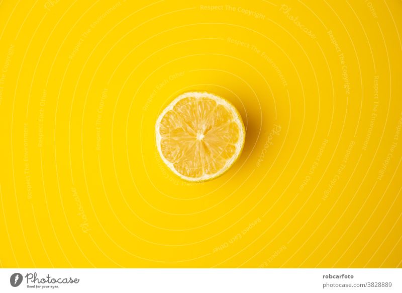 open lemon fruit on yellow background fresh isolated juicy healthy closeup food ripe sweet leaf succulent citrus juice ingredient vegetarian sour whole taste