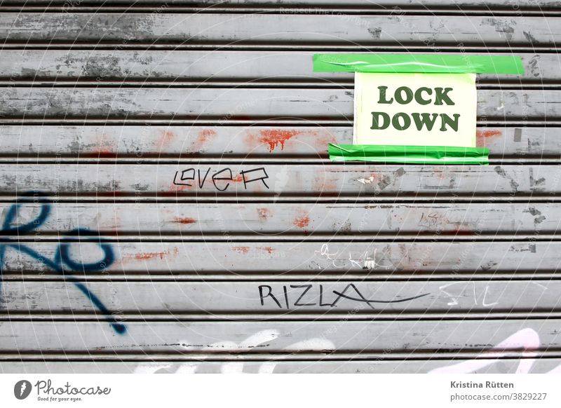 closed roller shutter with lockdown note l corona thoughts Closed too closure coronavirus Virus covid19 COVID pandemic broke bankruptcy Insolvency Business