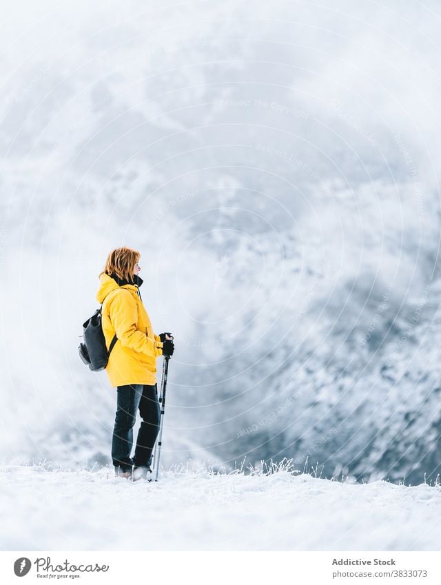 Unrecognizable traveler in mountains in winter snow trekking hike pole nature highland mountaineer pyrenees mountains andorra hiker adventure landscape explore