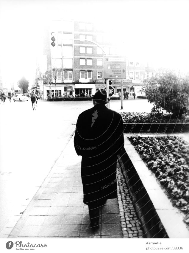 Man In Black White To go for a walk Coat Ambiguous Future Black & white photo Street Hat Signs and labeling Mixture MIB Man in black diversified Münster Concern