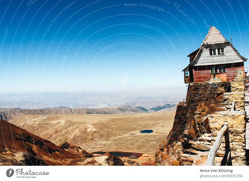 former ski hut in Bolivia Chacaltaya La Paz Mountain Vacation & Travel Exterior shot Tourism Glacial melt Ski hut Wooden hut Tall far Landscape Day