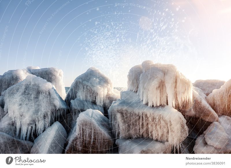 Mole of Saßnitz with icicle in winter Sassnitz Baltic Sea Rügen Winter Ice Ocean Water Frost White crest splash Icicle stones Break water breakwater Wild Wind